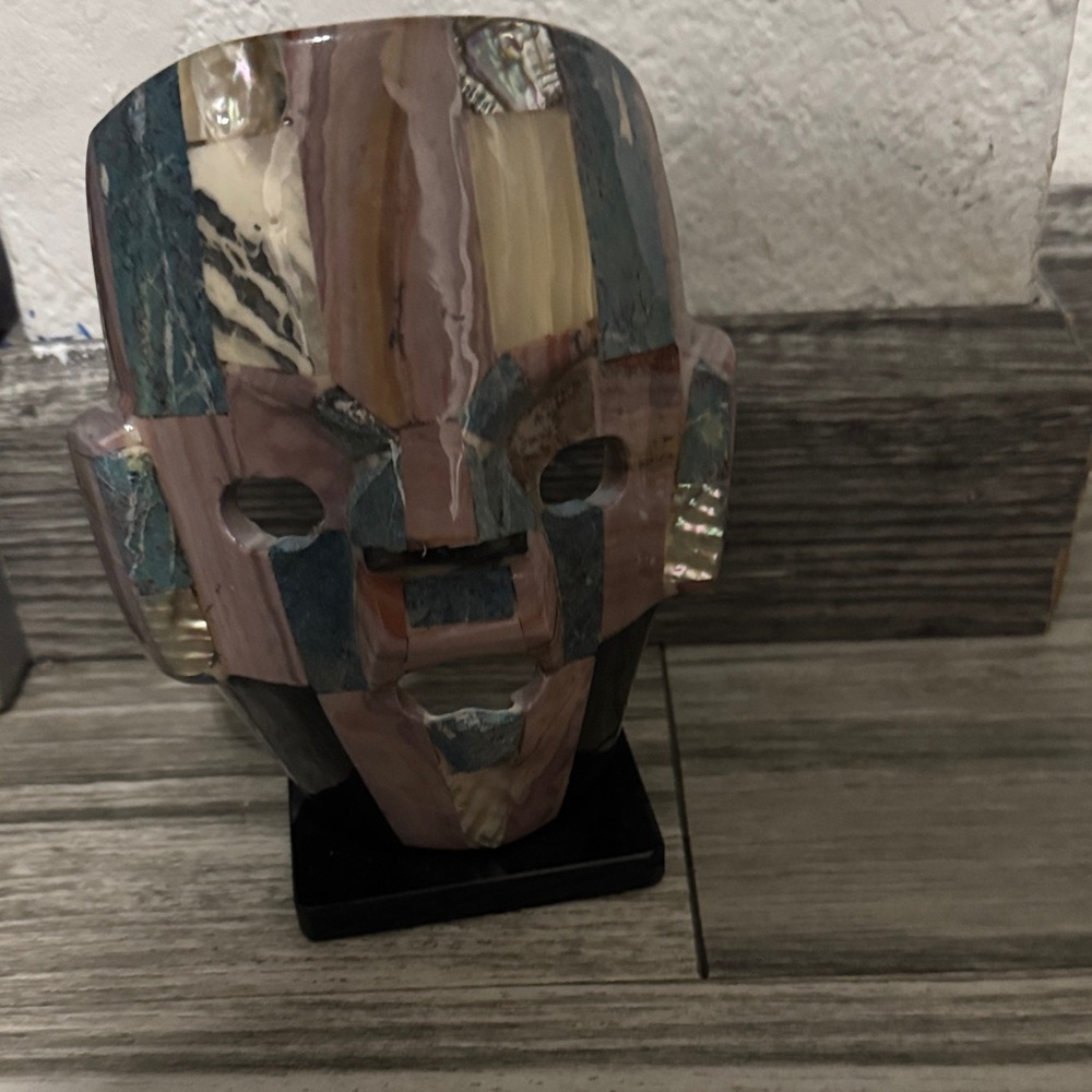 Artistic Stone Mask Sculpture with Multicolor Stripes